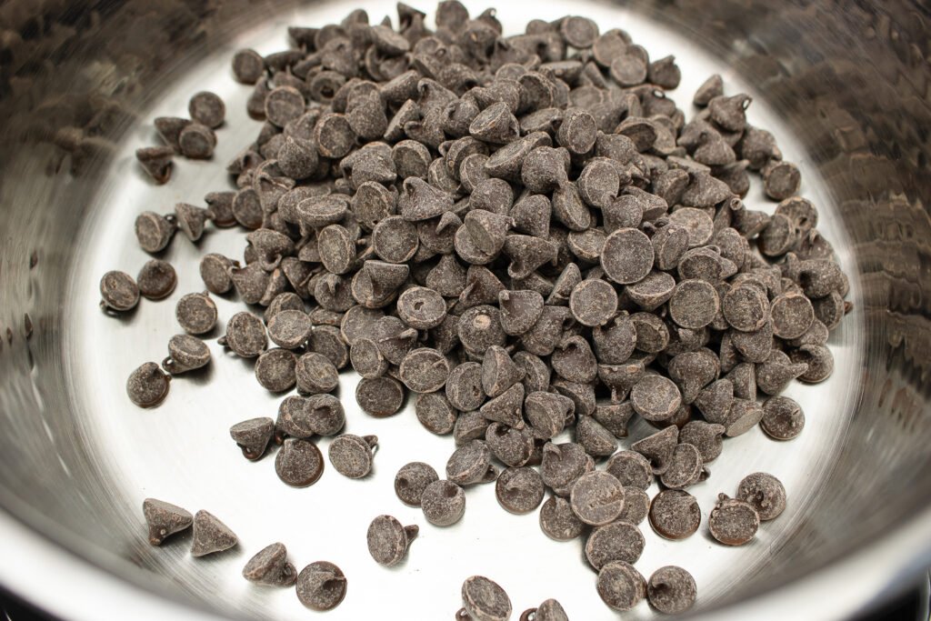 combining heavy cream with chocolate chips over medium-low heat to make chocolate mousse