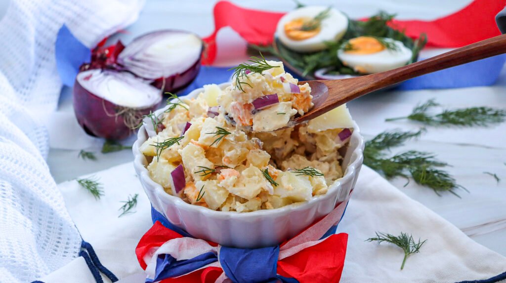 a bowl of creamy potato salad 