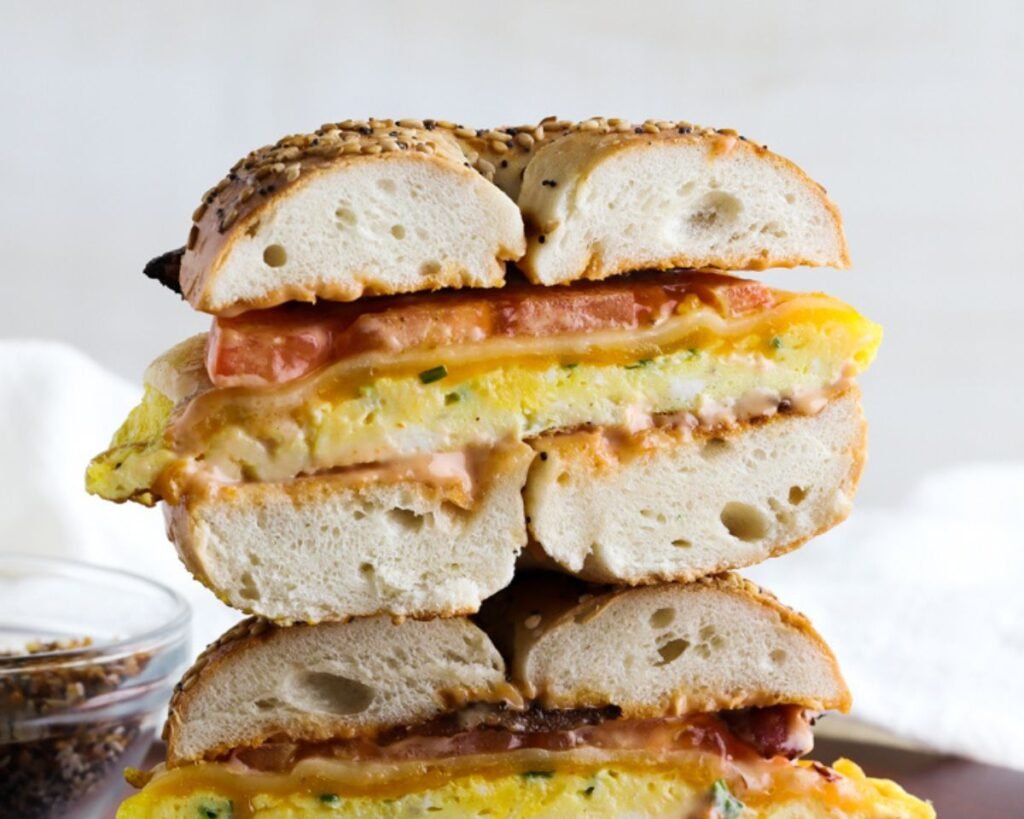 Stacked Bacon Egg and Cheese Bagel Breakfast Sandwich