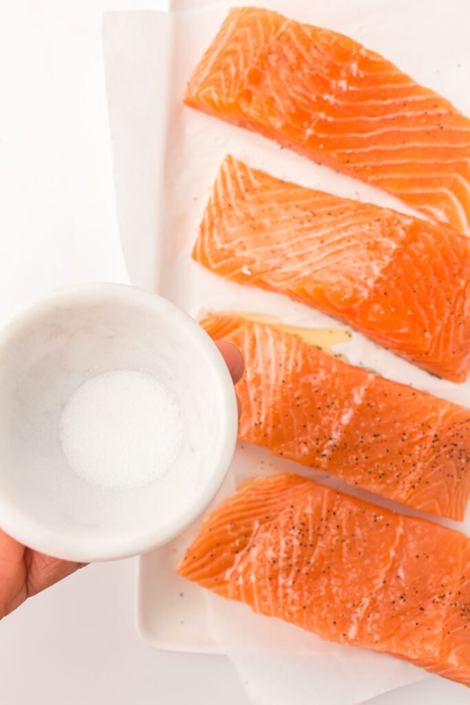 Season the fillets with salt and black pepper,